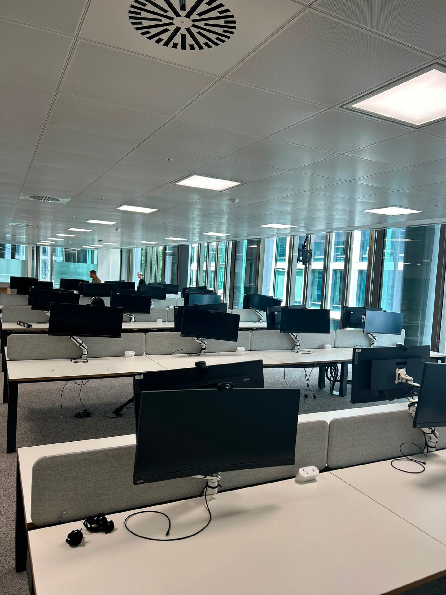 Precision workstation installation London — bench desks, ThinkVision monitors and cable management by Movir London installers